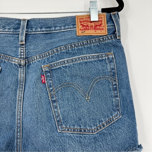 Levi's 501 medium wash button placket frayed raw edge whiskered denim shorts. - Picture 9 of 13